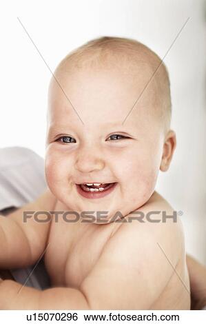 Close up of baby girls laughing face View Large Photo Image Stock Photograph - Close up of baby girls laughing face. Fotosearch
