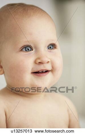 Close up of baby girls smiling face View Large Photo Image Stock Image - Close up of baby girls smiling face. Fotosearch