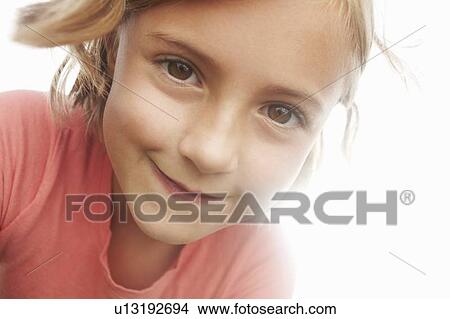 Close up of girls smiling face View Large Photo Image Picture - Close up of girls smiling face. Fotosearch