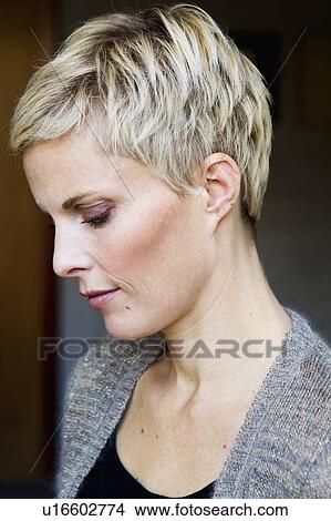 Close up of womans serious face View Large Photo Image Picture - Close up of womans serious face. Fotosearch