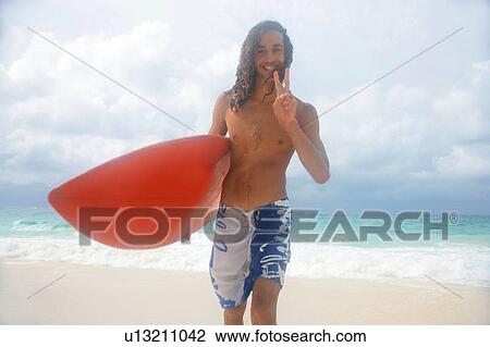 Stock Image - Close up of womans serious face. Fotosearch