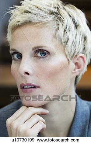 Close up of womans serious face View Large Photo Image Stock Photo - Close up of womans serious face. Fotosearch