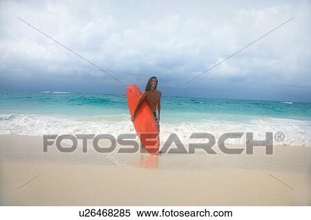 Stock Photography - Close up of womans serious face. Fotosearch