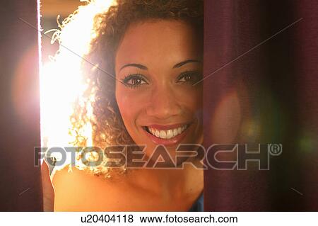 Stock Photo - Close up of womans smiling face. Fotosearch