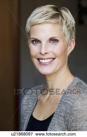Stock Photo - Close up of womans smiling face. Fotosearch