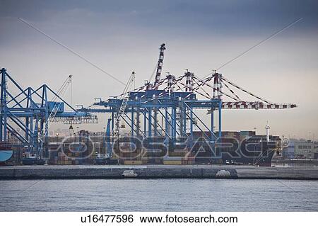 Containers in shipyard in harbor View Large Photo Image Stock Photograph - Containers in shipyard in harbor. Fotosearch