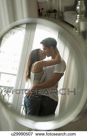 Couple kissing in mirror View Large Photo Image Stock Photo - Couple kissing in mirror. Fotosearch