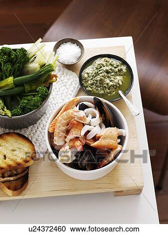 Dish of prawns with bread and vegetables View Large Photo Image Stock Image - Dish of prawns with bread and vegetables. Fotosearch