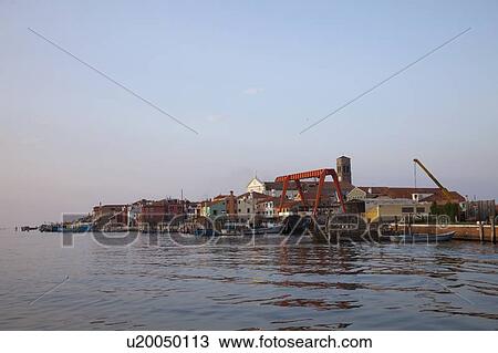 Harbor at waterfront in village View Large Photo Image Stock Image - Harbor at waterfront in village. Fotosearch