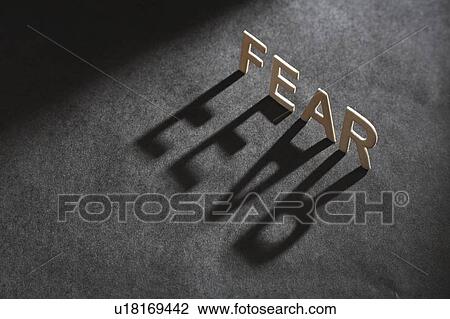 Stock Image - Letters spelling? fear casting shado. Fotosearch