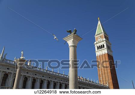 Low angle view of columns and tower View Large Photo Image Stock Photo - Low angle view of columns and tower. Fotosearch