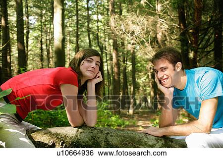 Man standing in forest View Large Photo Image Stock Photograph - Man standing in forest. Fotosearch