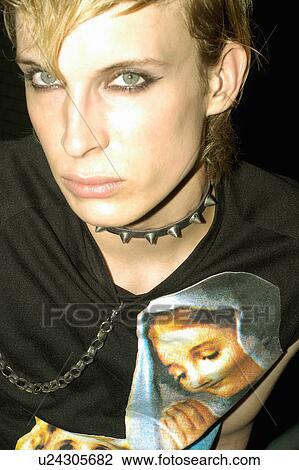 Stock Image - Man wearing spiked jewelry. Fotosearch