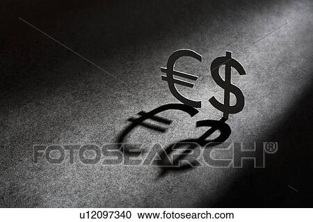 Metal currency signs casting shadow View Large Photo Image Stock Image - Metal currency signs casting shadow. Fotosearch