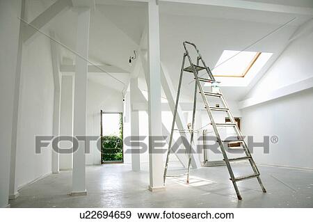 Stock Photo - Metal ladder in empty house. Fotosearch