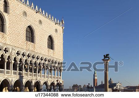Ornate building and statue on column View Large Photo Image Stock Photo - Ornate building and statue on column. Fotosearch