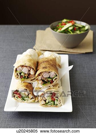 Stock Photography - Plate of chicken vegetable rolls. Fotosearch