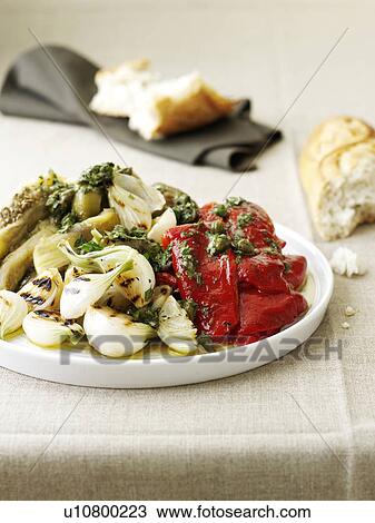 Stock Image - Plate of stewed vegetables in sauce. Fotosearch