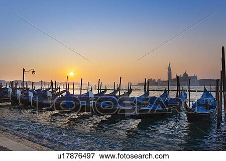 Rowboats docked in harbor View Large Photo Image Stock Photo - Rowboats docked in harbor. Fotosearch