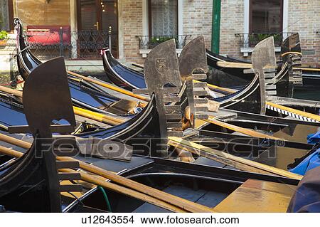 Rowboats in urban canal View Large Photo Image Picture - Rowboats in urban canal. Fotosearch