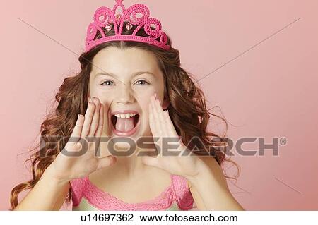Shouting girl wearing pink tiara View Large Photo Image Stock Image - Shouting girl wearing pink tiara. Fotosearch
