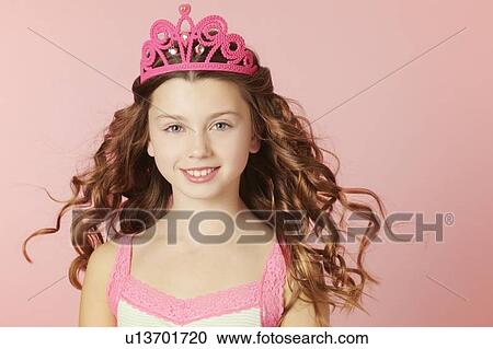 Smiling girl wearing pink tiara View Large Photo Image Stock Image - Smiling girl wearing pink tiara. Fotosearch