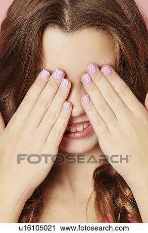 Smiling girl with polka dot manicure View Large Photo Image Stock Image - Smiling girl with polka dot manicure. Fotosearch