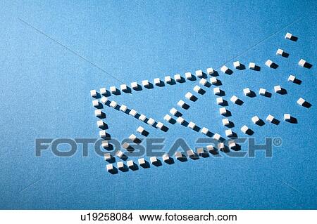 Picture - Sugar cubes in envelope shape. Fotosearch