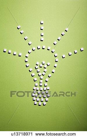 Stock Image - Sugar cubes in light bulb shape. Fotosearch