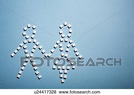 Stock Photo - Sugar cubes in shape of couple. Fotosearch