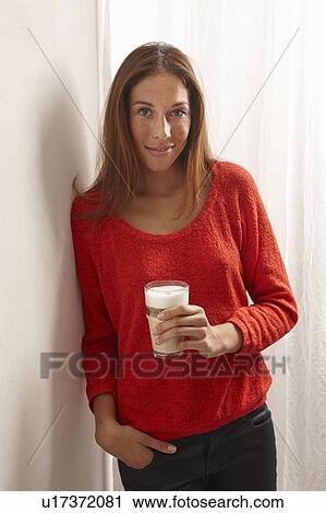 Stock Image - Woman having cup of coffee. Fotosearch
