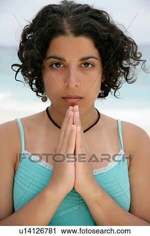 Woman meditating on tropical beach View Large Photo Image Stock Image - Woman meditating on tropical beach. Fotosearch