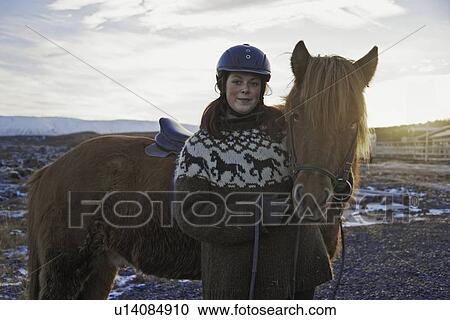 Woman smiling with horse outdoors View Large Photo Image Stock Image - Woman smiling with horse outdoors. Fotosearch