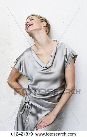 Woman wearing silk gown View Large Photo Image Stock Photo - Woman wearing silk gown. Fotosearch