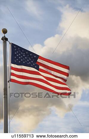 American flag in front of smoke stacks View Large Photo Image Stock Image - American flag in front of smoke stacks . Fotosearch