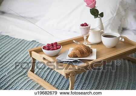 Breakfast plate on bed View Large Photo Image Stock Photo - Breakfast plate on bed. Fotosearch