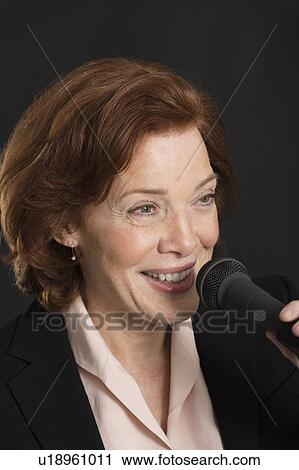 Businesswoman performing speech View Large Photo Image Stock Image - Businesswoman performing speech. Fotosearch