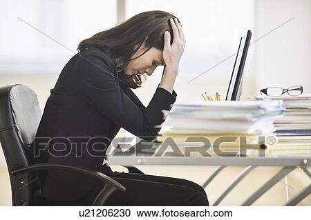 Businesswoman with head in hands View Large Photo Image Stock Image - Businesswoman with head in hands. Fotosearch