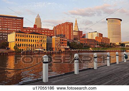 Stock Photograph - Cityscape at sunset. Fotosearch