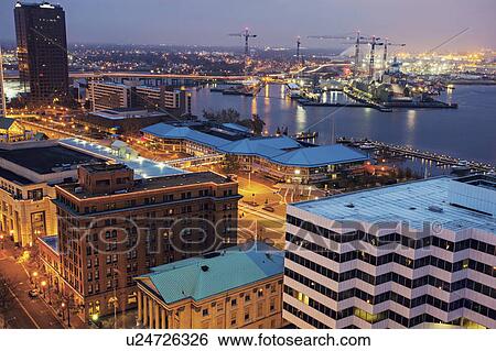 Cityscape with cranes at night View Large Photo Image Stock Photograph - Cityscape with cranes at night. Fotosearch