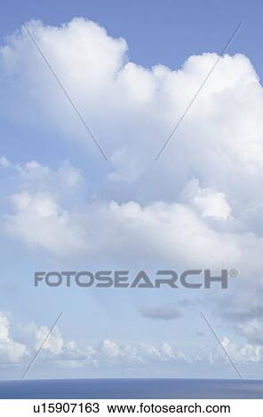 Cloudy sky over sea View Large Photo Image Stock Image - Cloudy sky over sea. Fotosearch