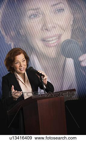 Stock Photo - Female politician performing speech. Fotosearch
