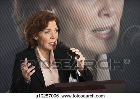Female politician performing speech View Large Photo Image Stock Photograph - Female politician performing speech. Fotosearch