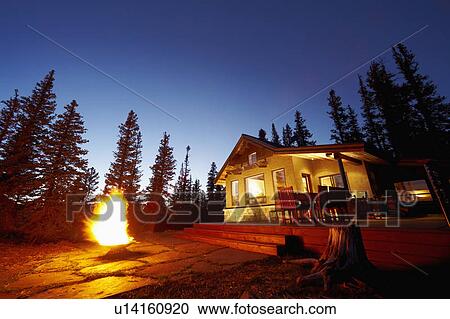 Fire pit in front of house View Large Photo Image Stock Image - Fire pit in front of house. Fotosearch