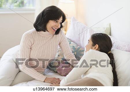 Grandmother and granddaughter (16-17) talking View Large Photo Image Stock Photo - Grandmother and granddaughter (16-17) talking. Fotosearch