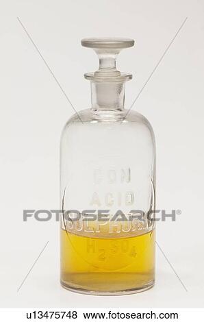 Laboratory flask containing yellow liquid View Large Photo Image Stock Photo - Laboratory flask containing yellow liquid. Fotosearch