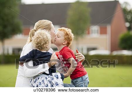 Mother with her children (2-3, 4-5) View Large Photo Image Stock Photograph - Mother with her children (2-3, 4-5). Fotosearch