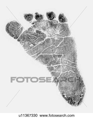 Stock Image - Negative image of human footprint . Fotosearch