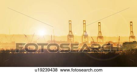 Stock Photo - New York Harbor at sunset. Fotosearch