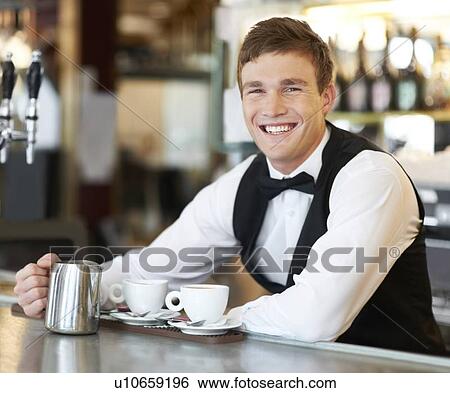 Portrait of barista holding milk jug View Large Photo Image Stock Photograph - Portrait of barista holding milk jug . Fotosearch